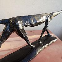 Patine bronze vieilli sur sculpture en béton